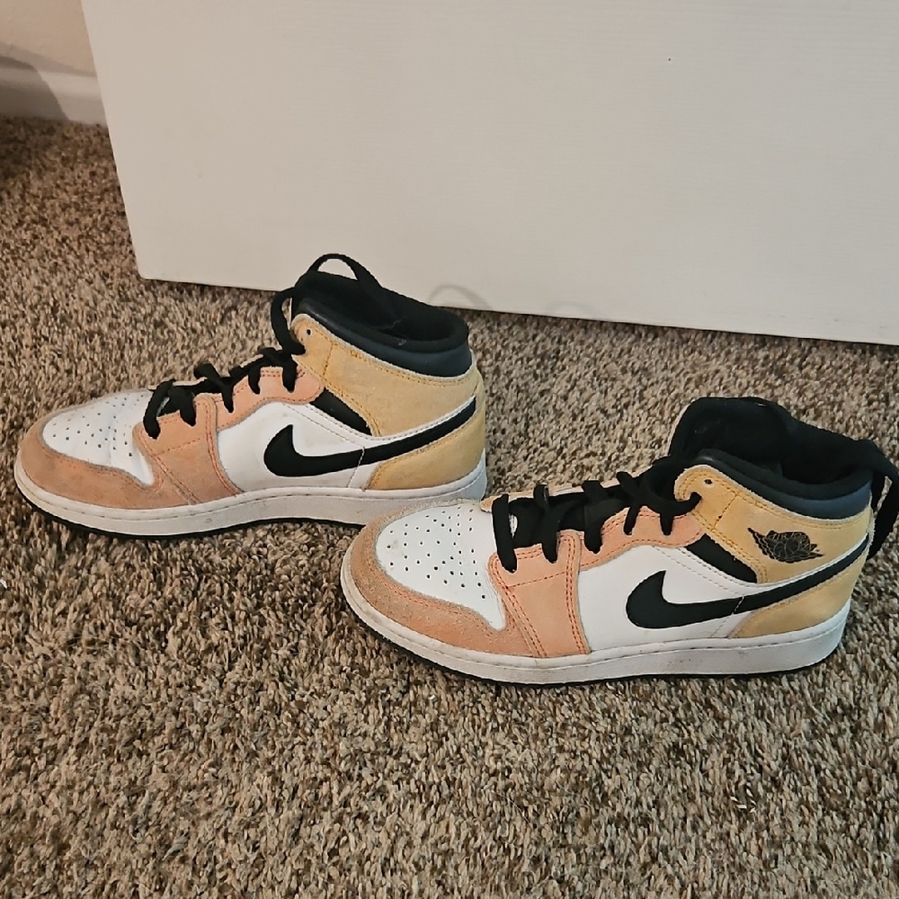 Nike High-Top Sneakers in Black, White, and Tan